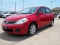 Red Alert 2009 Nissan Versa 1.8 SL Hatchback