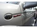 2003 Nissan Frontier SC V6 Crew Cab 4x4 Badge and Logo Photo