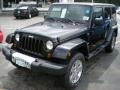 2011 Black Jeep Wrangler Unlimited Sahara 4x4  photo #1