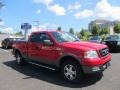 2005 Bright Red Ford F150 XLT SuperCab 4x4  photo #1