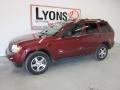 2007 Red Rock Crystal Pearl Jeep Grand Cherokee Laredo 4x4  photo #1