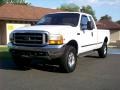 1999 Oxford White Ford F250 Super Duty XLT Extended Cab 4x4  photo #9