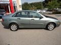 2005 Light Tundra Metallic Ford Focus ZX4 SE Sedan  photo #7