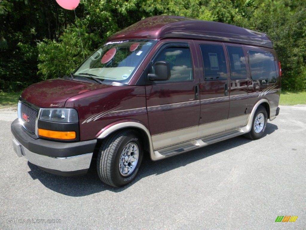 Midnight Red Metallic GMC Savana Van