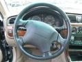 Beige 2002 Subaru Outback Limited Wagon Steering Wheel