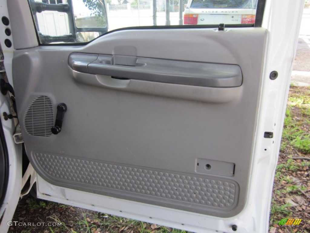 1999 Ford F450 Super Duty XL Regular Cab Dually Chassis Stake Truck Medium Graphite Door Panel Photo #53203547