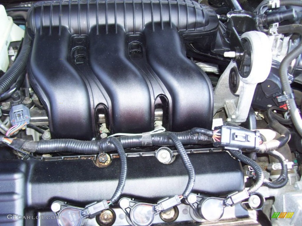 2006 Montego Luxury AWD - Dark Blue Pearl Metallic / Pebble photo #11
