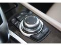 Oyster/Black Controls Photo for 2012 BMW 7 Series #53242815