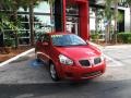 2010 Red Hot Metallic Pontiac Vibe 1.8L  photo #1