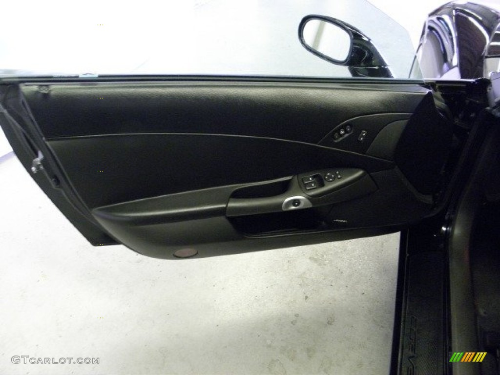 2005 Chevrolet Corvette Coupe Ebony Door Panel Photo #53252749