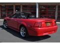 1999 Laser Red Metallic Ford Mustang V6 Convertible  photo #2