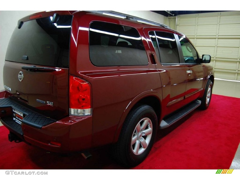 2010 Armada SE - Tuscan Sun Red Pearl / Charcoal photo #6