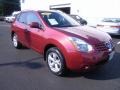 2009 Venom Red Nissan Rogue SL AWD  photo #1