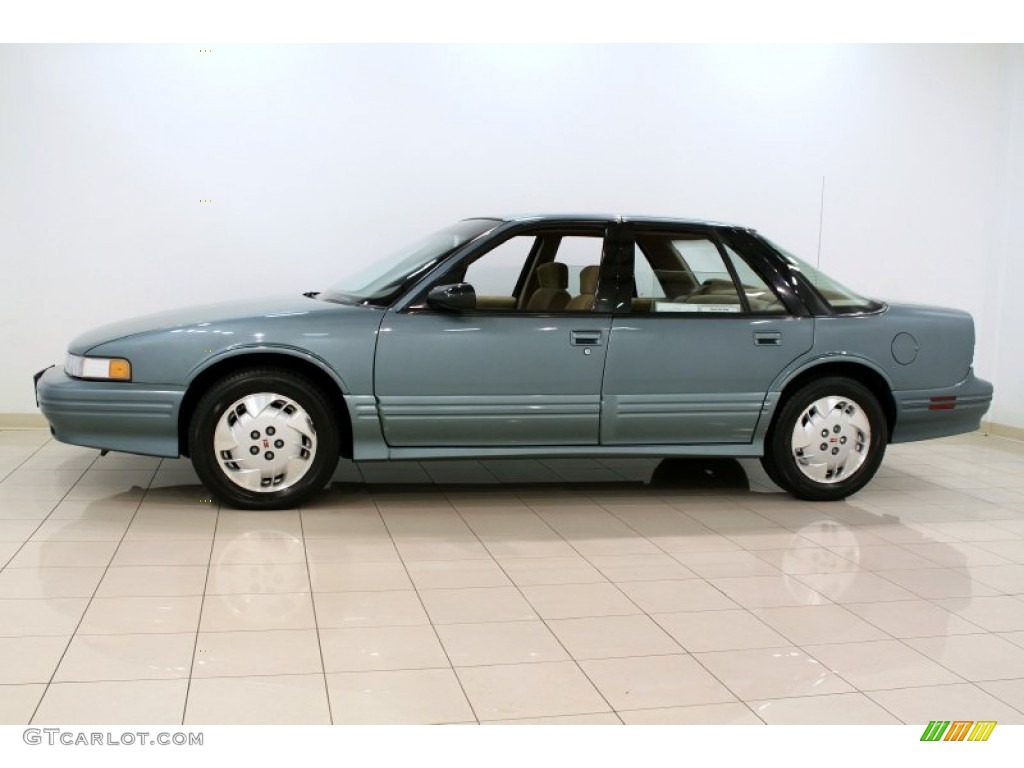 Malachite Metallic 1995 Oldsmobile Cutlass Supreme S Sedan Exterior Photo #53352898