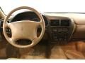 1995 Oldsmobile Cutlass Supreme Beige Interior Dashboard Photo