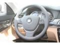 2012 BMW 7 Series Saddle/Black Interior Steering Wheel Photo