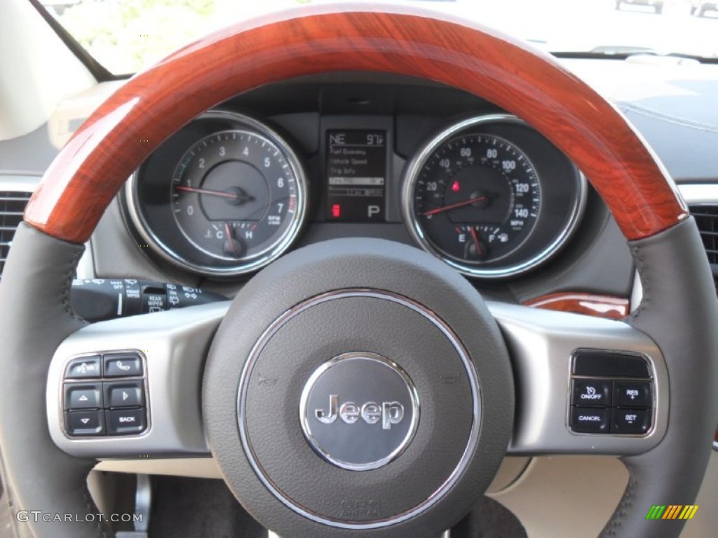 2012 Jeep Grand Cherokee Overland Dark Frost Beige/Light Frost Beige Steering Wheel Photo #53389892