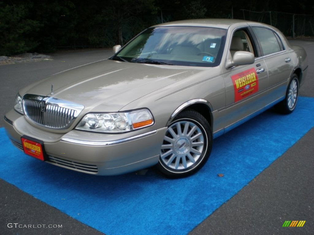 Pueblo Gold Metallic Lincoln Town Car