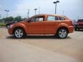 2011 Mango Tango Pearl Dodge Caliber Mainstreet  photo #6