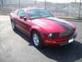 2005 Redfire Metallic Ford Mustang V6 Deluxe Coupe  photo #1