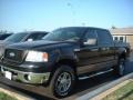 2006 Black Ford F150 XLT SuperCrew 4x4  photo #3