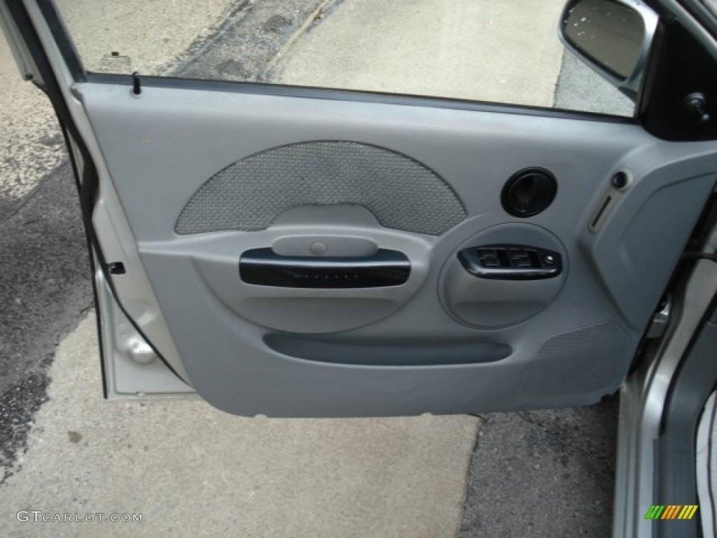 2004 Chevrolet Aveo LS Sedan Gray Door Panel Photo #53473273