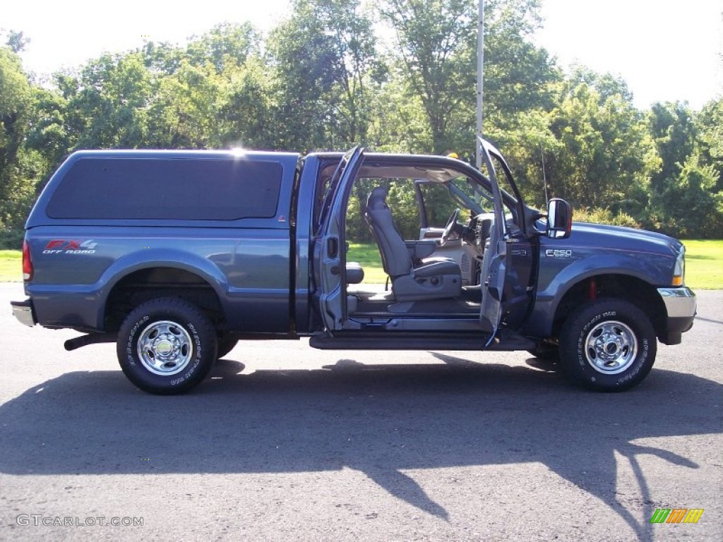 2004 F250 Super Duty Lariat SuperCab 4x4 - Medium Wedgewood Blue Metallic / Medium Flint photo #59