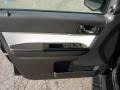 Cashmere Leather/Charcoal Black Door Panel Photo for 2009 Mercury Mariner #53490457