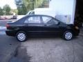 2003 Black Sand Pearl Toyota Corolla LE  photo #26