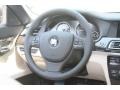 Oyster/Black Steering Wheel Photo for 2012 BMW 7 Series #53521483