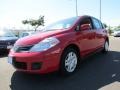 2011 Red Alert Nissan Versa 1.8 S Hatchback  photo #1