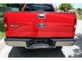 2004 Bright Red Ford F150 Lariat SuperCab 4x4  photo #16