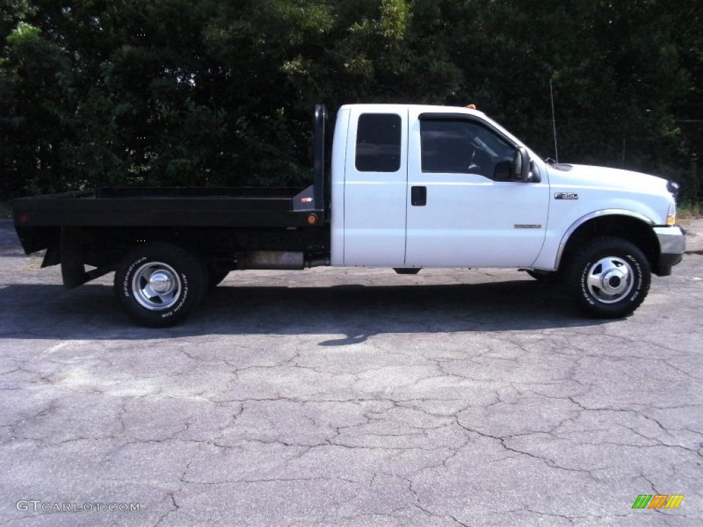 2004 F350 Super Duty XLT SuperCab 4x4 Stake Truck - Oxford White / Medium Flint photo #1