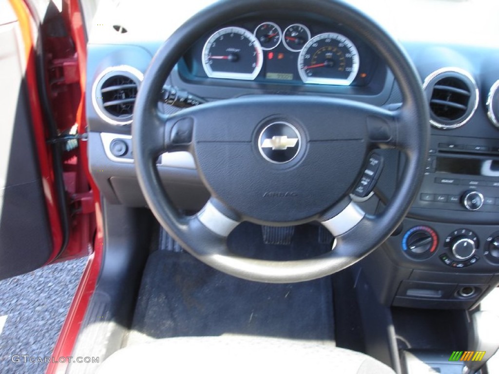 2007 Chevrolet Aveo LT Sedan Charcoal Black Steering Wheel Photo #53558763