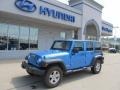 2010 Surf Blue Pearl Jeep Wrangler Unlimited Islander Edition 4x4  photo #1