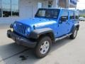 2010 Surf Blue Pearl Jeep Wrangler Unlimited Islander Edition 4x4  photo #2