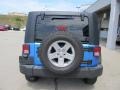 2010 Surf Blue Pearl Jeep Wrangler Unlimited Islander Edition 4x4  photo #4