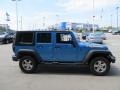 2010 Surf Blue Pearl Jeep Wrangler Unlimited Islander Edition 4x4  photo #5