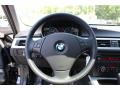 Black 2011 BMW 3 Series 328i Sports Wagon Steering Wheel