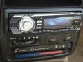 Tan Audio System Photo for 1997 Saturn S Series #53640645