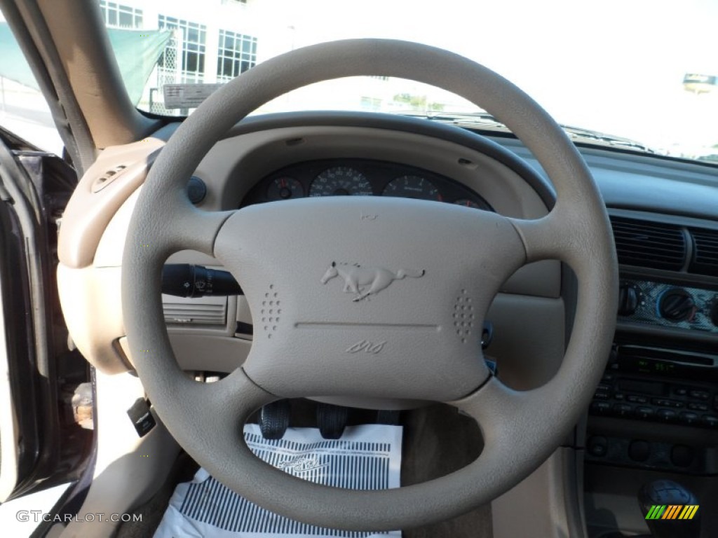 2002 Ford Mustang V6 Coupe Medium Parchment Steering Wheel Photo #53660933
