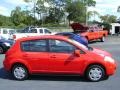 2009 Red Alert Nissan Versa 1.8 S Hatchback  photo #6
