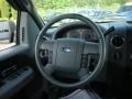 2006 Black Ford F150 XLT SuperCab 4x4  photo #26