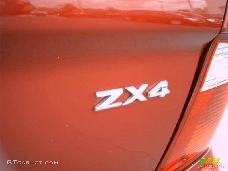 2005 Focus ZX4 SES Sedan - Blazing Copper Metallic / Dark Pebble/Light Pebble photo #21