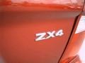 2005 Blazing Copper Metallic Ford Focus ZX4 SES Sedan  photo #21