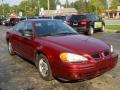 Redfire Metallic - Grand Am SE Sedan Photo No. 15