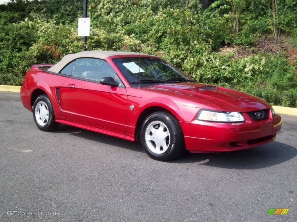 Laser Red Metallic 1999 Ford Mustang V6 Convertible Exterior Photo #53769122