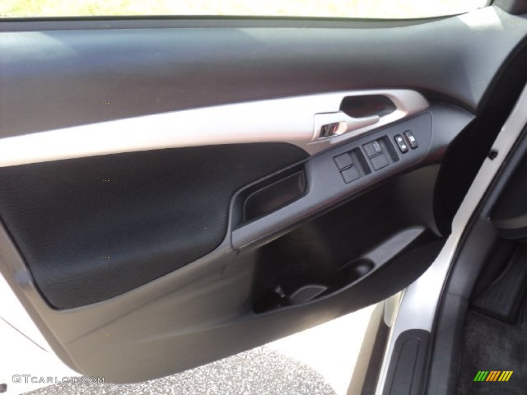 2009 Pontiac Vibe 2.4 AWD Ebony Door Panel Photo #53800483
