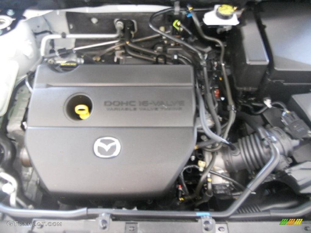 2010 MAZDA3 i SV 4 Door - Crystal White Pearl Mica / Black photo #11