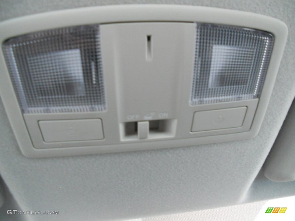 2010 MAZDA3 i SV 4 Door - Crystal White Pearl Mica / Black photo #32